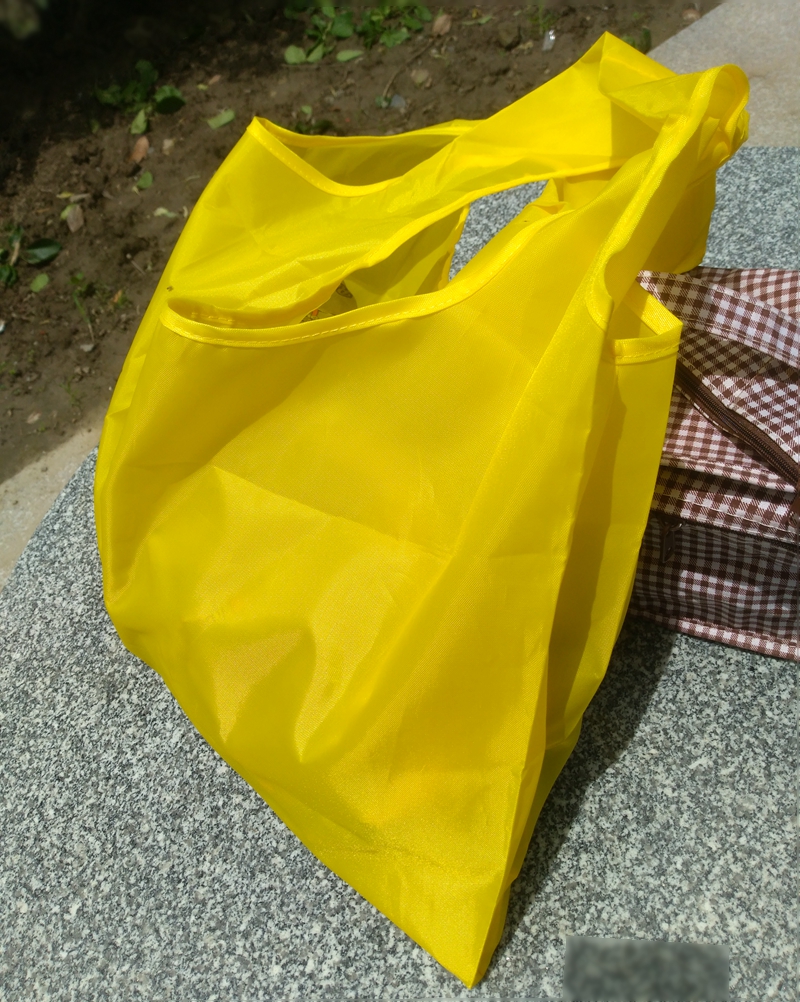 黄色宽手提大容量超市购物袋厚尼龙环保袋便携买菜包单面字母 新款